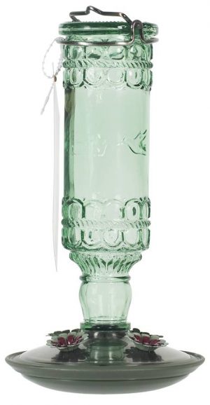 Antique glass hummingbird feeder