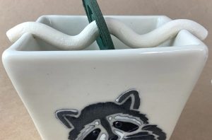 Racoon Coil Holder