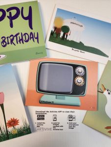 illustration of a retro television set with a blank screen among snippets of other greeting-type cards. 