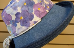 Watercolour pansies with medium denim brim